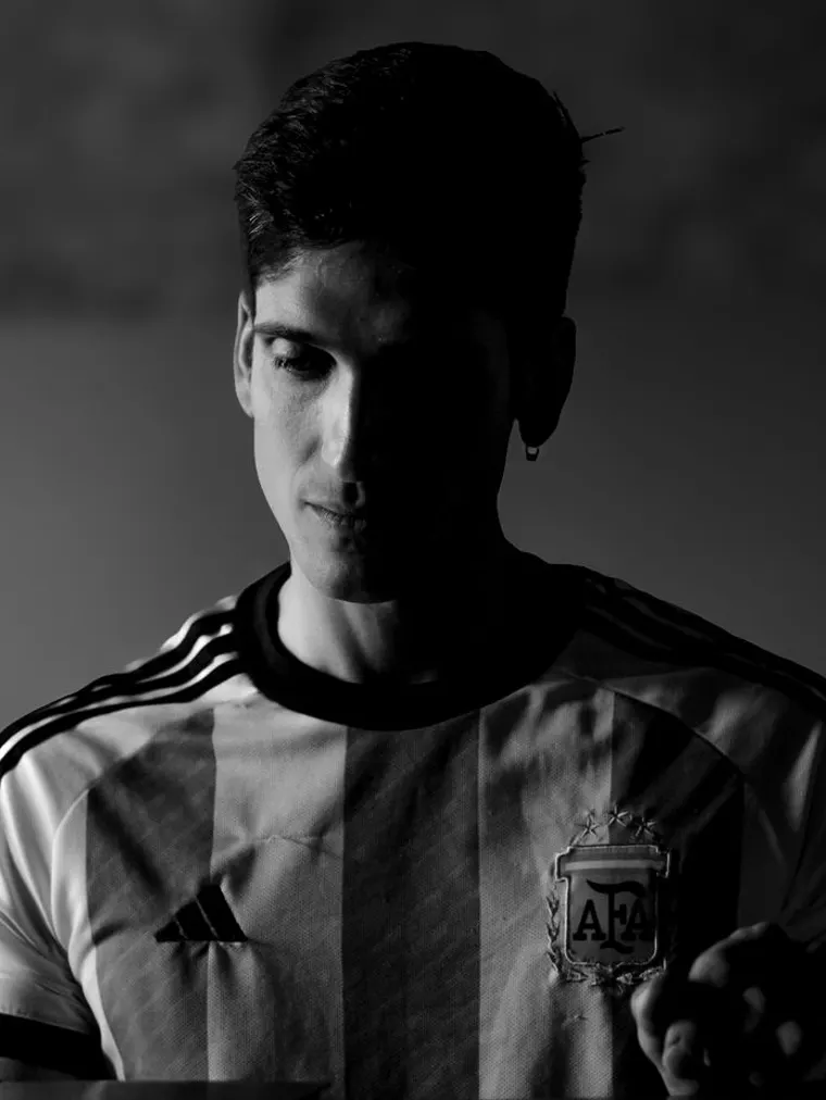 Portrait of a man in a national team shirt, black and white