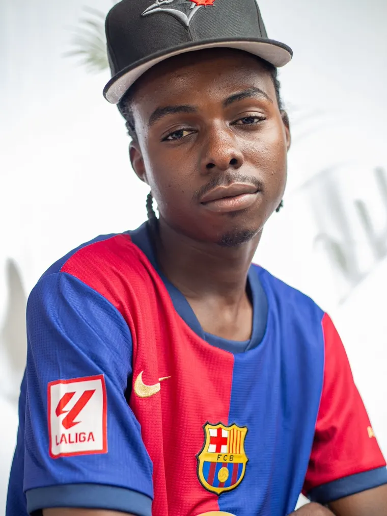 Customer in a Barcelona shirt